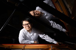 Xinyuan Wang